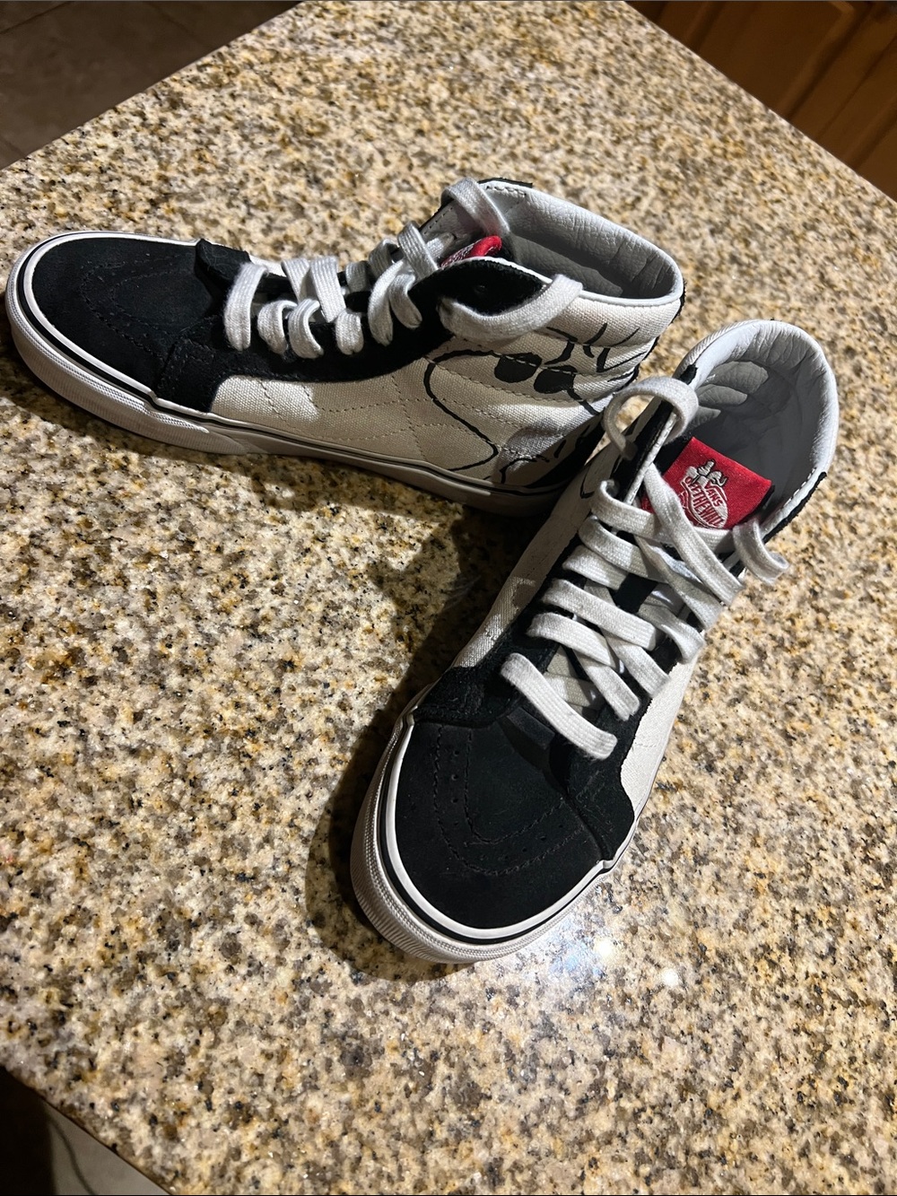 Vans Black and White High-Top Sneakers with Red Logo Accent